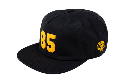 Odyssey '85 5-Panel Hat (Black w/ Golden Rod Felt Applique)